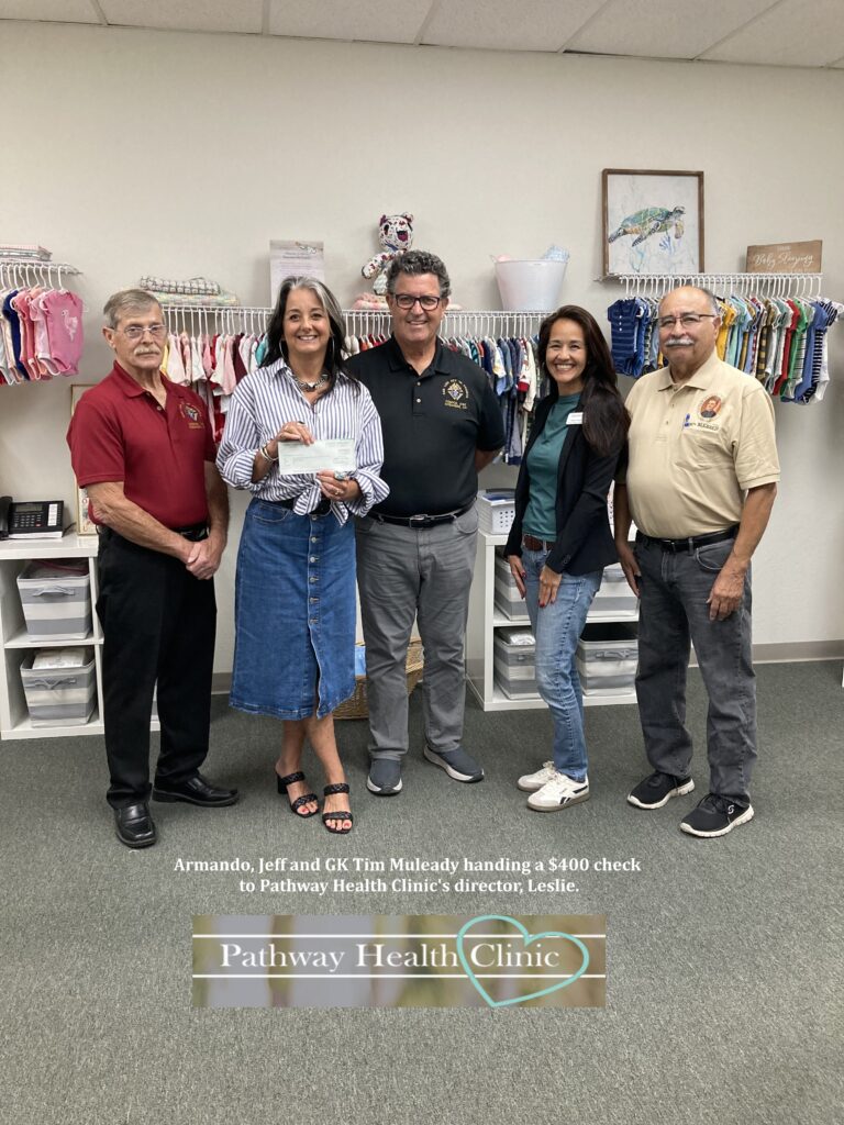 Armando, Jeff, and GK Tim Muleady proudly presented a $400 check to Leslie, the director of Pathway Health Clinic. This generous donation from the Knights supports the clinic's mission to provide essential healthcare services to the community. Thank you to the Knights for their continued support!  
